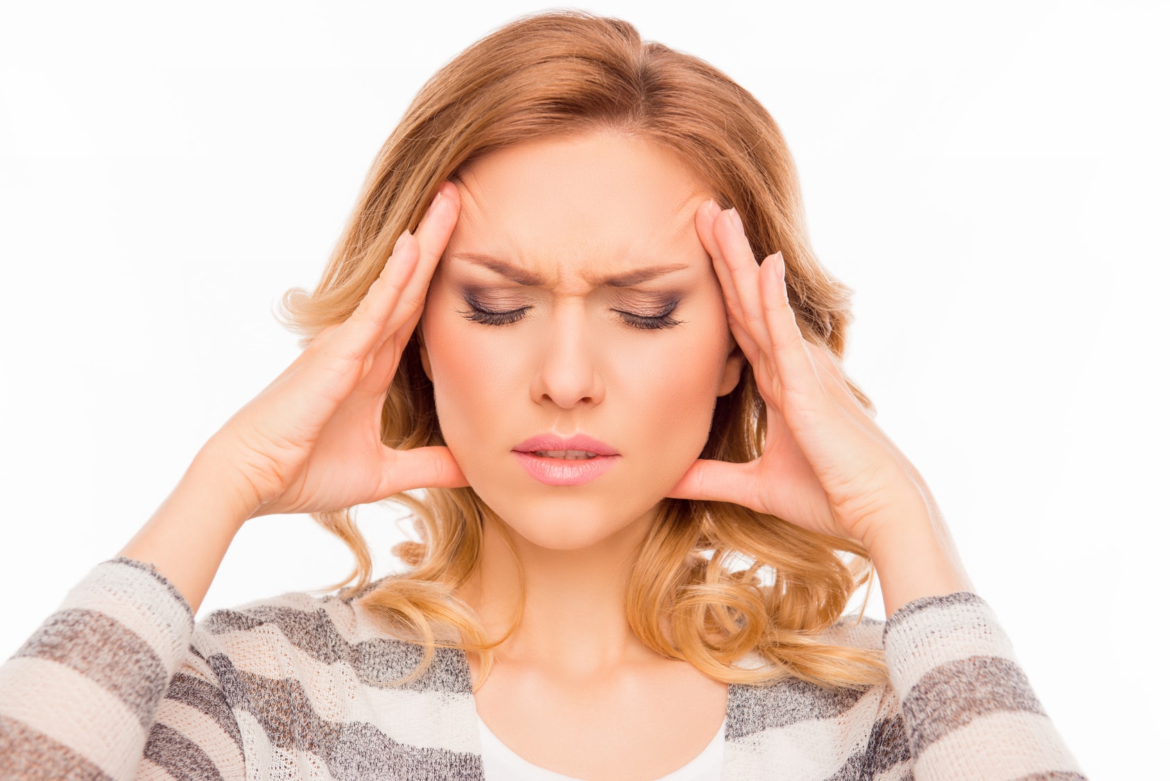 Attractive young woman suffering of strong migraine